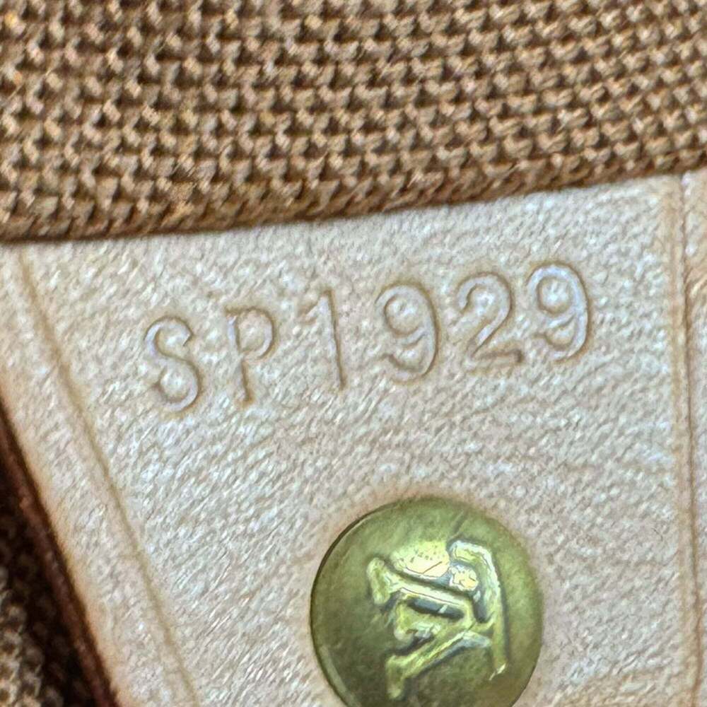 LOUIS VUITTON Brown Monogram Canvas Backpack - Picture 13 of 13